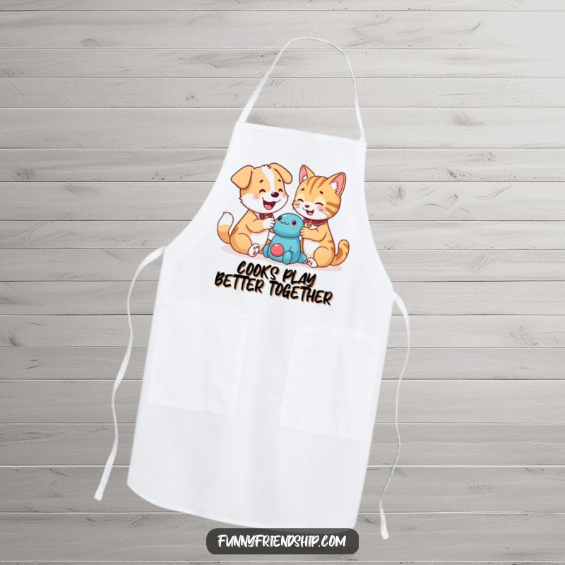 Funny dog and cat characters sharing a toy while in a kitchen setting, printed on a durable apron, a funny gift for cooks.