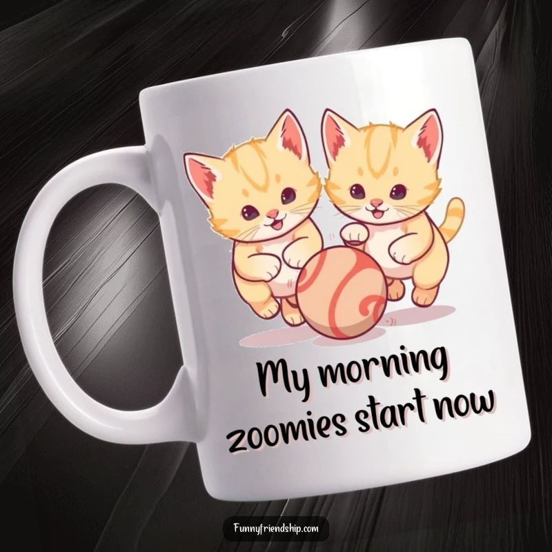 Funny mug showcasing two energetic kittens in hot pursuit of a single bouncing ball, capturing pure playful joy and a love for playtime.
