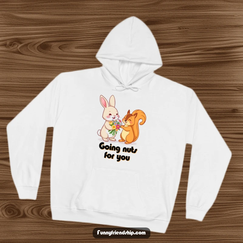Funny hoodie showing a playful rabbit offering a flower bouquet to a squirrel, symbolizing friendship and the beauty of nature.