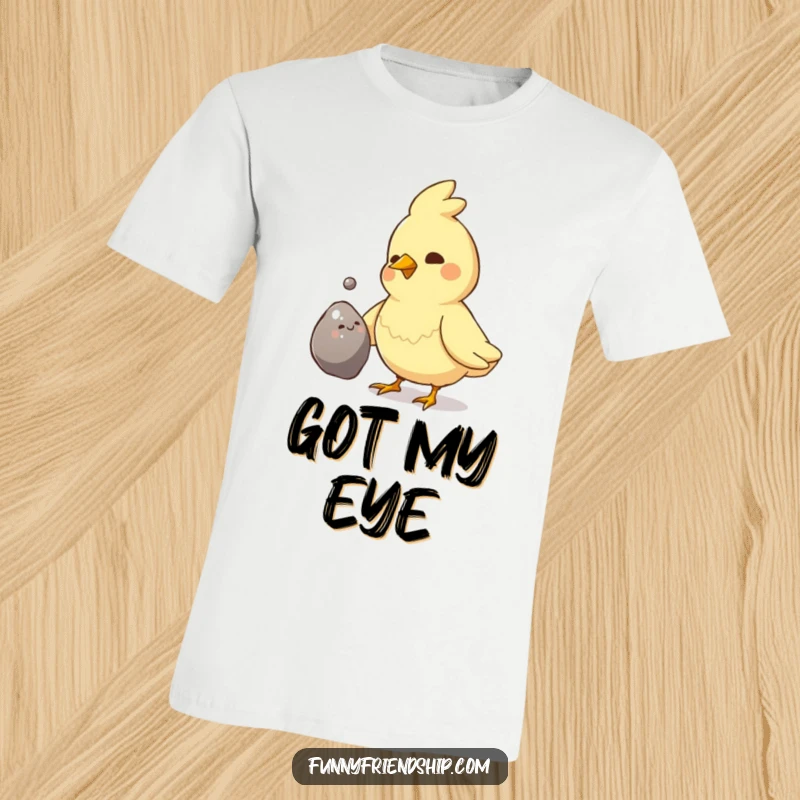 Funny Bird Pebble Gift T-Shirt: Bird presenting shiny pebble, cute avian design, symbol of affection, a funny gift.